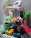 Gund Sesame Street Super Grover and Rosita 5 Piece Playset -  (Baby Safe) Super Grover 5 1/2", Rosita 5 1/2", Kitty Cat 3", Tree 5 1/2", Super Grover Telephone Booth (closes with a zipper pulled by a streak of lightening to store the pieces in) 6 1/2" high, 4" wide, 4" deep + 2 1/4" handle