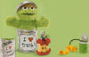 Gund Plush Sesame Street Oscar the Grouch 3 Piece Playset - (Baby Safe)  the playset includes Oscar the Grouch in his trash can (the trash can has a touch and close fastener) Apple zip-along, and Slimey the worm with a mini trash can.  11 inches high