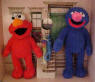 Sesame Street Plush Grover and Elmo Set "Monsters Aren't Scary" includes a mini Sesame Street Flashlight Key Ring  7 1/2 inch Elmo and an 8 inch Grover