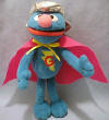 Gund Sesame Street Plush SUPER Grover - made from a soft plush fabric.  He is wearing a plush metallic helmet on his head and a red cape around his neck.  On his chest a yellow lightening bolt with a red G in the center.  7 1/2 inches
