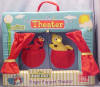 Gund Sesame Street Plush Finger Puppet Theater - includes an Elmo and Big Bird Finger Puppet.  There are 2 pockets to store the puppets in.  The Puppet Theater is a plush with soft foam filling for stability. There are 2 pockets to store the puppets in.  The back folds down for a performance stage and the curtains will open and close 16 inches wide by 13 inches high by 2 inches deep