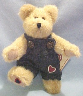 Boyds Jimmy T Bearheart Plush Teddy Bear Boyds Jimmy T Bearheart Plush Teddy Bear
- introduced Spring 2003 and has been retired
- This FABULOUS Best Dressed Varigated Beige Bear is wearing a denim jumpsuit with metal buttons which are decorated with hearts. There is a red heart embroidered on its pant leg and a black heart trimmed with red embroidered on the bottom of his right foot.
- safe for ages over 3