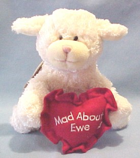 Boyds Valentines Day Luv Ewe Plush Lamb Boyds Valentines Day Luv Ewe Plush Lamb
-introduced in 2002 and has been retired
- This EXTREMELY SOFT AND CUDDLY cream colored lamb is made from the new materials which makes it hard to leave alone! It is holding a red heart shaped pillow with 'Mad About Ewe' embroidered on it in white. It has a very sweet face. It is limited to Valentines Day 2003.
-safe for ages over 3