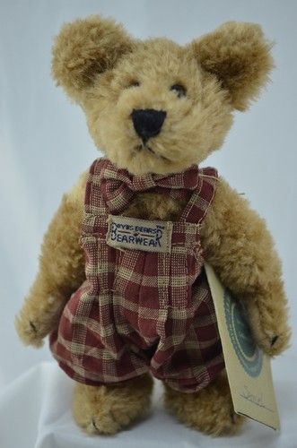 Boyds Teddy Bear Samuel Boyds Teddy Bear Samuel
- introduced Spring 1998 and has been retired
- Samuel is JUST ADORABLE! He is wearing a red and cream plaid romper and a matching bow tie. He is ready to take you out on the town in is spiffy outfit! Samuel is a beautiful Chenille Beige Bear.