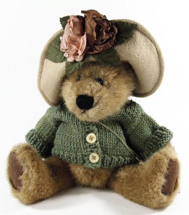 Boyds Teddy Bear Mrs. Trumbull Boyds Teddy Bear Mrs. Trumbull
- introduced Spring 1998 and has been retired
- Mrs Trumbull is dressed in a beautiful green button up sweater. Her adorable little taupe felt hat is accented with a large pink rose and smaller smoky pink roses with luscious green leaves.