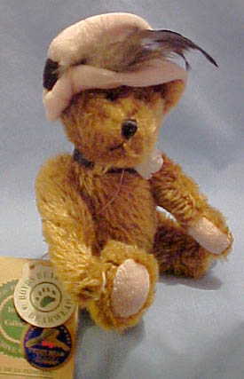 Boyds Chanel de la Plumtete Teddy Bear Boyds Chanel de la Plumtete Teddy Bear
- Introduced in 1995 and has been retired
- Golden Teddy Award Teddy Bear Review Winner
- she has movable arms and legs.