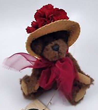 Boyds Ginnie Higgenthorpe Teddy Bear Boyds Ginnie Higgenthorpe Teddy Bear
- introduced Spring 2000 and has been retired
- In keeping with family Traditions, Ginnie Higgenthorpe is eager to learn propah Hattery from her Auntie Lavonne. Who better to teach her the fine Art of Caps...with all the Blooms, Buttons and Bows to accessorize them Just Right! Ginnie is wearing a large hat with burgundy flowers. Around her neck is a large burgundy bow that helps hold her little hat on.