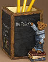 Boyds Desk Accessory Number 1 Teacher Pencil Holder - (made of cold cast resin, introduced Fall 2004 and has been retired) Celebrate a spectacular teacher with this resin pencil holder, which features a lil' bear cub, who stands on a stack of antique schoolbooks and writes "#1" teacher on the chalkboard. (not a toy) 4 1/4 inches high by 3 inches wide