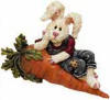 Boyds Fridgewear Magnet Carie Z. Carrottop - (introduced Spring 2000 and has been retired) There's no better spot for a Hare to recline than atop a big fresh Carrot straight from the field or garden! Carie is mighty proud of this specimen - it looks like a Blue Ribbon winner fer sure. This Fridgewear Magnet will ensure that your Refrigerator won't be Bear - of Carrots anyway! 2 1/2 inches wide 2 inches high