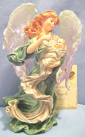 Boyds Charming Angel Ariella with Child "Guardian Angel of Motherhood" - (introduced the Spring of 2002 and has been retired) Ariella, the Guardian of Motherhood, is present from the instant a mother holds a newborn in her arms to the bittersweet moment when a mother lets go and watches as her children grow. Ariella provides guidance, wisdom, and reassurance when a Mom needs it most. She is that gentle voice that whispers sweet words of wisdom in your ear when motherhood presents its toughest challenges and most rewarding moments. Ariella brings to you a tiny Golden Charm...a keepsake to remind you of your own personal Guardian Angel of Motherhood. On the bottom of the figure it reads: "Children are the best thing that happens to parents...they come into this world with a sprinkling starshine which is touched up periodically by their Guardian Angel." - E.E. Smith 6 1/2 inches high