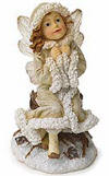 Boyds Faeriefrost Freesia Faeriechill First Frost (introduced Fall 2003 and has been retired)  &nbsp;Freesia has traveled many a mile in the newly fallen snow. She has stopped to rest on an old tree stump, catch her breath, and enjoy the winter wind as it whips past. She's dressed in a warm coat with trim and features iridescent resin wings.  Quote on bottom of figure:  "Who has seen the wind? Neither you nor I; But when the trees bow down their heads, The wind is passing by." - Christina Rossetti  4 1/4 inches high