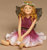 1st Edition Boyds FaeriePetal Roselynn Faeriesilk Gentle Sunshine - (Introduced Spring of 2004 and has been retired) Roseylnn is as fair as a newly opened rose blossom! This delicate faerie basks in a warm summer sun and features iridescent sparkle wings and a sparkle rose garland in her hair.  Quote: "Think of all the beauty still left around you and be happy." - Anne Frank 