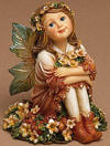 2nd Edition Boyds Faeriewood Patience Fall Harvest (introduced Fall 2004 and has been retired) Patience sits quietly and watches as autumn arrives in all its splendor. She features sparkle wings and adorns her hair with pumpkin blossoms. Quote on bottom of figure: "Happiness is the harvest of a quiet eye." - Austin O'Malley 3 1/2 inches