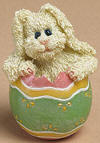 Boyds Easter Bunny Eggster Figurine - (introduced Spring 2004, and has been retired) This lil' bitty bunny Eggster is a perfect Easter basket surprise for anyone! (not a toy)  2 inches