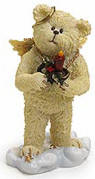 Boyds Lil Wings Joy Angel Bear with Candle - (introduced Fall 2003 and has been retired) Joy is celebratin' the festive season! This lil' teddy angel features intricately sculpted resin wings, a gold halo, and a sculpted base, and holds a holiday candle. Quote: "A light heart lives long." - Shakespeare 3 inches