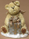 1st Edition Boyds Lil Wings Giftie Angel Bear with Present - (introduced Fall 2004 and has been retired) Giftie can't wait to give his present to a special friend! This sweet little angel bear stands on a cloud base and holds a sparkle package with a big gold bow. Quote: "The best gift is peace." 2 1/4 inches