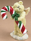 2nd Edition Boyds Lil Wings Candy with Peppermint Candy Cane - (introduced Spring 2006) Wrap up some of the sweetness of the holiday season with Candy. No...not the sweet treat...Candy is an adorable little angel bear figurine who features lots of hand-decorated details and an inspirational quote! Comes boxed for gift-giving. Quote: "In the sweetness of friendship let there be laughter and sharing of pleasures." - Kahil Gibran 3 inches