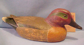 Boyds' Wills Creek Collection The Edgewater Series Green Wing Teal Drake Duck (#3 in the Series) (introduced Fall 2001 and has been retired) The Green Wing Teal is one of the fastest flying ducks and is small in size. The Drake features a chestnut head with a dark green, yellow-edged mask over the eye. 8 inches long 3 inches high