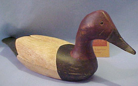 Boyds' Wills Creek Collection The Edgewater Series Canvas Back Drake Duck (#5 in the Series) (introduced Fall 2001 and has been retired) One of the largest North American diving ducks, the Canvas Back gets its name from its pale grey back and white sides that resemble canvas. The Drake's coloration incorporates rust, black, and pale grey. 8 3/4 inches long by 4 inches high