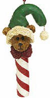 Boyds Rufus Dandycane Candy Cane Teddy Bear Ornament - (introduced Fall 2003 and has been retired)  Rufus is a sweet bear trinket to hang on the tree! This ornament features a sculpted Bearstone character--with stocking cap and dangling sparkle pom pom-set atop a candy cane stick. Comes in its original box.  4 1/2 inches