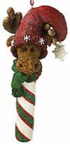 Boyds Monty Moose Dandycane Candy Cane Ornament - (introduced Fall 2003 and has been retired)  Monty is a sweet moose trinket to hang on the tree! This ornament features a sculpted Moose Troop character-with stocking cap and dangling snowflake accent-set atop a candy cane stick. Comes in its original box.  4 1/2 inches