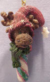 Boyds Monty Moose Dandycane Candy Cane Ornament - (introduced Fall 2003 and has been retired)  This mini moose ornament features a sweet moose character-in snowflake stocking cap with dangling sparkle snowflake accent-set atop a candy cane stick.   2 1/4 inches