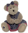 Boyds Patricia P Bearheart Dressed with Hearts - &nbsp;(introduced Spring 2003 and has been retired)  Patricia's livin' in the good ol' days! This beige bear wears a headband with star bow, a dress with heart, and a heart applique on her foot pad.&nbsp; Poseable jointed arms, legs and head. (safe for ages over 3) 12 inches high