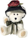 Boyds Teddy Bear Wixie Lee Hacket - (Dated Fall 2001 and has been retired)  For evenings on the town, light beige Wixie Lee prefers a black velvet hat with black net veiling and a cabbage rose.  6 inches and poseable