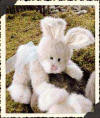 Boyds Buffie Bunnyhop Bunny Rabbit - (introduced Spring 2000 and has been retired) She's sporting the newest shade in Boyds' Fashion line - we call it "French Vanilla". You'll say "Oui" when you see this pretty pastel beige-and-powder white hare with her neckbow of sheerest Voile. Ooh La La! (safe for ages over 3) 8 inches and poseable