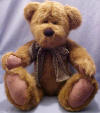 Boyds Collin T Bearsley Teddy Bear - Hello!  I'm part of H.B.'s Heirloom Series.  Of Course, like all of the friends in The Head Bean Collection.  I'm hand-stitched and fully jointed in the same Olde World Tradition started over 100 years ago.  The folks at Boyds love Olde World Quality stuff like me.  Hope you do too!  16 inches and poseable
