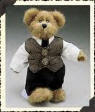 Boyds Edmund Teddy Bear -  (introduced Fall 1999 and has been retired)  Edmund looks every inch the Young Executive in his Wall Streeter vest and tie. He is limited to 1 years production  8 inches