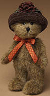 Boyds Amber McPunkin Teddy Bear in Velvet Hat with Mum- (introduced Fall 2004 and has been retired) Amber is as lovely as an autumn sunset! This mocha bear wears a mum-topped velvet hat and satin ribbon bow.  (safe for ages over 3)  6 inches and poseable
