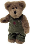 Boyds Tommy Leafowitz Teddy Bear - (introduced Fall 2001 and has been retired) Tommy, a rust bear who luvs to rake, is dressed for cooler weather in his green corduroy romper complete with embroidered rust leaf. To haul the leaf piles to the curb, he uses his trusty wooden wagon, painted a deep shade of pine green.  8 inches and poseable