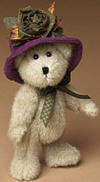 Boyds Bridgette Beardeaux Teddy Bear in Plum Corduroy Hat - (introduced Fall 2004 and has been retired) Bridgette is the beauty of the Beardeaux family! This light beige bear wears a plum corduroy hat with wired brim and cabbage rose and a green satin ribbon bow.  (safe for ages over 3)  6 inches and poseable