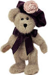 Boyds Sasha Dubeary Teddy Bear introduced Fall 2002 and has been retired.  Sasha, a light beige bear, is the Winter Ball Debutante and wows the crowd in her velvet beret with velvet rose and matching ribbon bow.  Safe for ages over 3.  10 inches and poseable