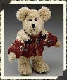 Boyds Ashley Huntington Creamy Beige Teddy Bear- (introduced Fall 1999 and has been retired)  Dressed in the brilliant shades of the season, Ashley's little sweater is a fine example...knit of Spice, Earth, Wheat, and Goldenrod tones. Her Creamy fur is Chenille.  6 inches and poseable