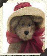 Boyds Auntie Lavonne Higgenthorpe Teddy Bear -  (introduced Spring 2000 and has been retired) Auntie Lavonne is dressed in her best hat with burgundy bow. She is a beautiful mocha colored bear.  12 inches and poseable