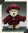 Boyds Teddy Bear Kayla Mulbeary - (introduced Fall 1999 and has been retired)  In her handknit Sweater and Hat of woolly mohair-type yarn, dyed in the Mulbeary clan's signature color of Royal Winterberry, Kayla is as snug as a Bear Rug. She was born in 1999 and then Boyds allowed her to retire in 2001, so she could grow up where ever she may roam.  6 inches and poseable