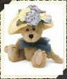 Boyds Nanette Dubeary Teddy Bear -  (introduced Spring 2000 and has been retired)  Even our tiniest Bears and Friends enjoy dressing up in fresh spring fashions...like a Picture Hat enhanced by just-picked blooms of Indigo and Sunny Yellow...and a shimmery sheer scarf. Oui, Oui, Nanette...c'est tres chic. She is a beautiful creamy beige plush teddy bear with jointed appendages.  6 inches and poseable