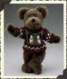 Boyds Teddy Bear Wayfer North - (introduced Fall 1999 and has been retired)  Wayfer is in his burgundy handknit pullover with a black-and-white checkered border and penguin portrait motif, he's stylin' from here to the Pole. An adorable mocha colored Teddy Bear with soft Plush fur. 10 inches and poseable