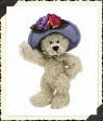 Boyds Twila Higgenthorpe Teddy Bear -   (introduced Spring 1997 and has been retired)  When the birds sing the Songs of Spring, you can be sure Twila Higgenthorpe is not more than an ear away. Wearing her newest Hattery, a Lavender Cloche trimmed with colorful Silk Flowers (roses are her Favorite!). Twila is a beautiful light beige Chenille furred bear.  6 inches and poseable