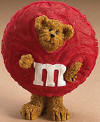 Boyds Bearstones Candy Peeker Red M & M Figurine - (introduced Fall of 2005) &nbsp;Everyone knows Red is the leader of the pack, but perhaps no one knows it more than this "M&M'S&reg;" lovin' bear! He's dressed up in a special peeker costume (check out the zipper on the back) that honors his favorite "M&M'S&reg;" Brand Character of all...Red! He's even got the confident attitude to go along with it!  4 inches
