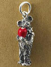 Boyds Sterling Silver Teddy Bear Charm Miss MacIntosh Teacher Bear with Apple - (introduced Fall 2004 and has been retired) Boyds' Miss Macintosh charm is created by Boyds Master Designers, depicting our teacher bear who holds onto her own red apple. Made from solid sterling silver and captures the same detail found on Boyds' award winning Bearstone figurines! 1/2 inch in size