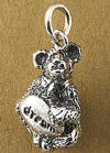 Boyds Sterling Silver Teddy Bear Charm Dream Bear - (introduced Fall 2004 and has been retired) Created by Boyds Master Designers, our Dream bear charm is made from solid sterling silver and captures the same detail found on Boyds award winning Bearstone figurines! 1/2 inch in size