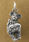 Boyds Sterling Silver Teddy Bear Charm Believe Bear - (introduced Fall 2004 and has been retired) Created by Boyds Master Designers, our Believe bear charm is made from solid sterling silver and captures the same detail found on Boyds' award winning Bearstone figurines! 1/2 inch in size