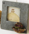 Boyds Noah's Ark Picture Frame - (introduced Spring 2000 and has been retired)  Here's a little pale blue picture keeper that you can tuck in yer suitcase or purse...a perfect memento of your High Seas adventure on Noah's Ark!