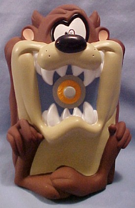 Adorable coin banks in Looney Tunes style. The always adorable Taz as a bank and he took it a step farther and put a safe's dial in his mouth. Just try to get the money out.