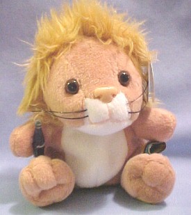 Coca Cola plush lions are cuddly soft stuffed animals. He wears a tag which describes information about Coca Cola in the country the lion came from.