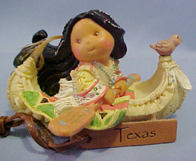 Friends of a Feather Texas Canoe with Indian Girl Figurine Friends of a Feather Texas Canoe with Indian Girl Figurine
- made of cold cast resin