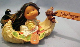 Friends of a Feather Michigan Canoe with Indian Girl Figurine Friends of a Feather Michigan Canoe with Indian Girl Figurine
- made of cold cast resin